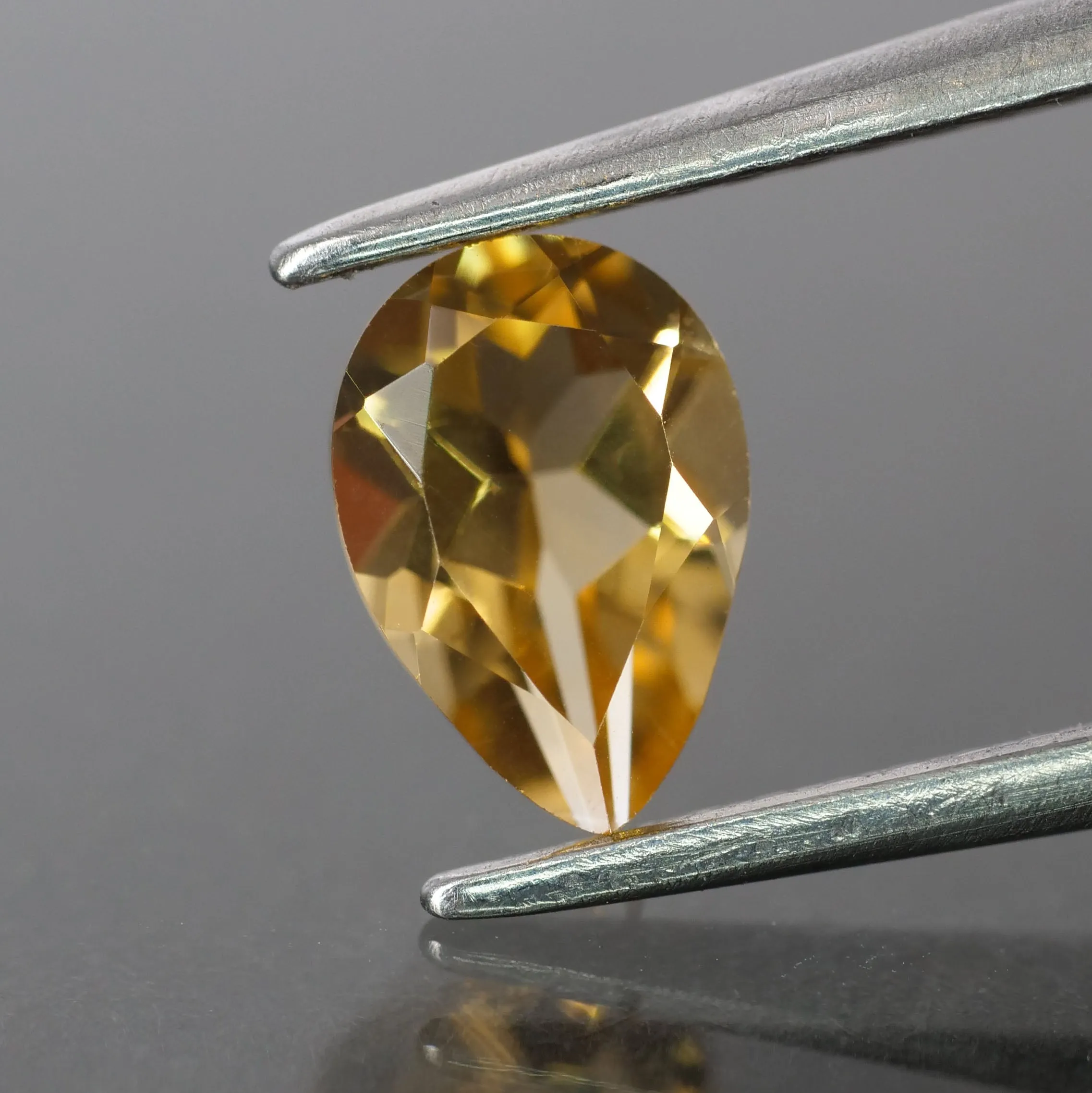 Citrine | natural, pear cut 7x5mm, VS, *0.6ct