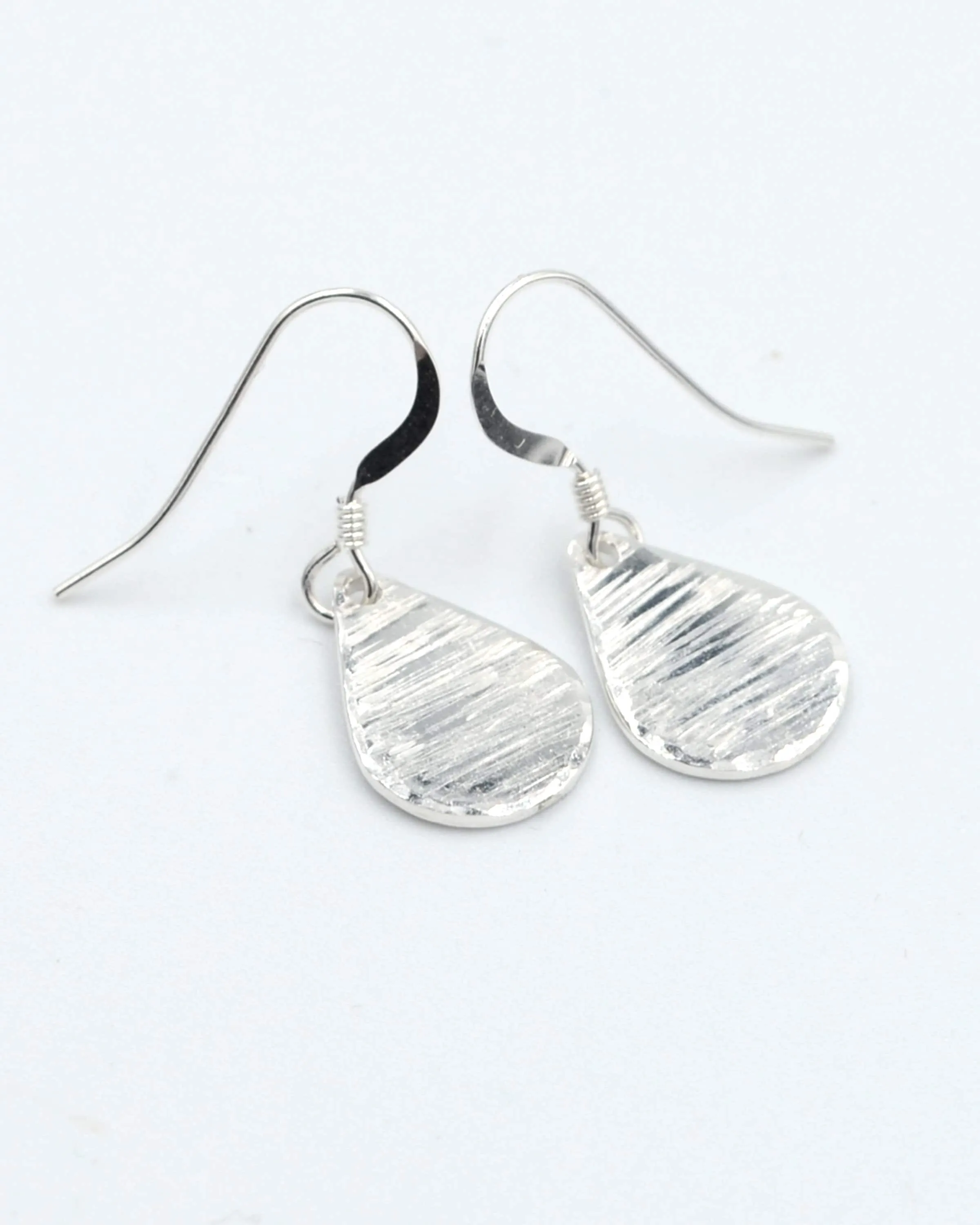 Simple silver hammered teardrop earrings, dainty dangling earrings, minimalist jewellery